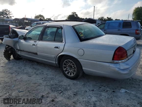 ✅ 2001 Ford Crown Victoria LX • VIN: 2FAFP74W81X106606 • Lot: 67630815. Listed on Copart with Not provided. Free auction sales archive from the USA and detailed vehicle history report at DreamBid. Image 2.