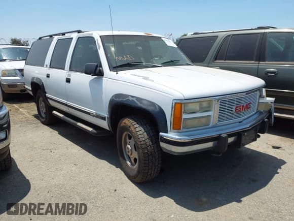 ✅ 1993 GMC Suburban • VIN: 1GKGK26N9PJ724480 • Lot: 42356513. Listed on IAAI with 132,704 mi. Free auction sales archive from the USA and detailed vehicle history report at DreamBid. Image 1.