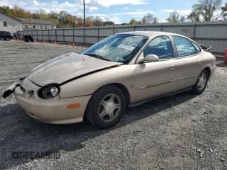 ✅ 1999 Ford Taurus SE • VIN: 1FAFP53S0XA141970 • Лот: 89710195. Опубликован ранее на Copart с пробегом 170 401 миль. Бесплатный доступ к архиву аукционных продаж из США и подробный отчёт об истории автомобиля на DreamBid. Изображение 1.