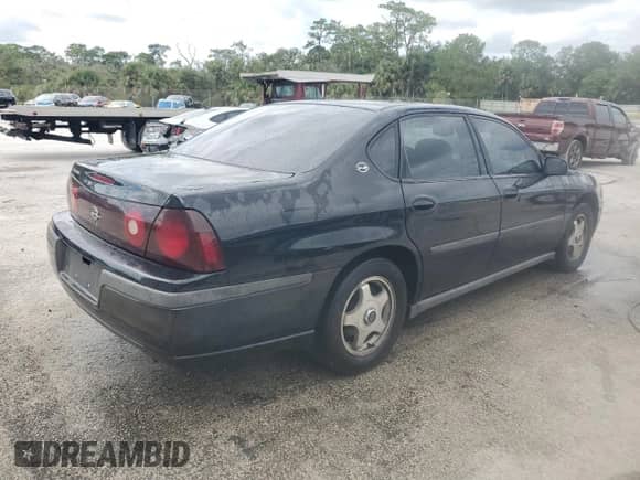 2003 Chevrolet Impala with VIN 2G1WF52E039260822, listed as a Copart auction lot 84739045 with 167,923 mi miles and Salvage title. Bid and sale history available at DreamBid. Image 3.