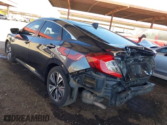 ✅ 2018 Honda Civic EX-L • VIN: JHMFC1F8XJX033602 • Лот: 42161015. Опубликован ранее на IAAI с пробегом 99 597 миль. Бесплатный доступ к архиву аукционных продаж из США и подробный отчёт об истории автомобиля на DreamBid. Изображение 3.
