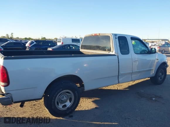 ✅ 2001 Ford F-150 XL • VIN: 1FTRX17W61KF65488 • Lot: 40807535. Listed on IAAI with 298,274 mi. Free auction sales archive from the USA and detailed vehicle history report at DreamBid. Image 12.