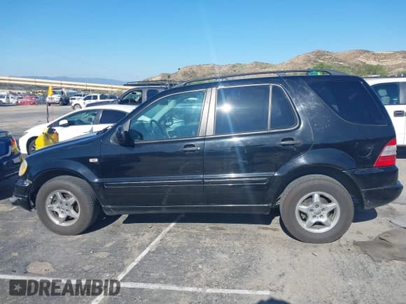 ✅ 2001 Mercedes-Benz M 320/430/500 • VIN: 4JGAB54E01A272539 • Лот: 42124321. Опубликован ранее на IAAI с пробегом 272 098 миль. Бесплатный доступ к архиву аукционных продаж из США и подробный отчёт об истории автомобиля на DreamBid. Изображение 14.