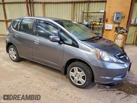 ✅ 2013 Honda Fit • VIN: LUCGE8G58D3008282 • Лот: 93811915. Опубликован ранее на Copart с пробегом Не указан. Бесплатный доступ к архиву аукционных продаж из США и подробный отчёт об истории автомобиля на DreamBid. Изображение 4.