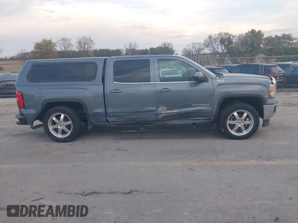 ✅ 2015 GMC Sierra 1500 SLE • VIN: 3GTU2UEC6FG279402 • Лот: 43454827. Опубликован ранее на IAAI с пробегом 111 929 миль. Бесплатный доступ к архиву аукционных продаж из США и подробный отчёт об истории автомобиля на DreamBid. Изображение 13.