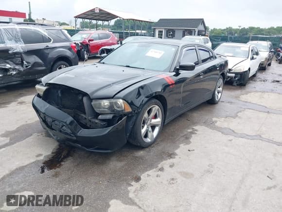 ✅ 2012 Dodge Charger RT • VIN: 2C3CDXCTXCH105083 • Лот: 42705752. Опубликован ранее на IAAI с пробегом 221 460 миль. Бесплатный доступ к архиву аукционных продаж из США и подробный отчёт об истории автомобиля на DreamBid. Изображение 2.
