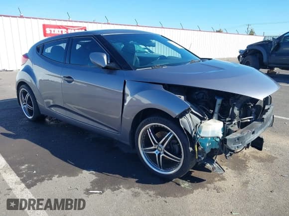 ✅ 2016 Hyundai Veloster • VIN: KMHTC6AD9GU258069 • Lot: 43335440. Listed on IAAI with 279,461 mi. Free auction sales archive from the USA and detailed vehicle history report at DreamBid. Image 1.