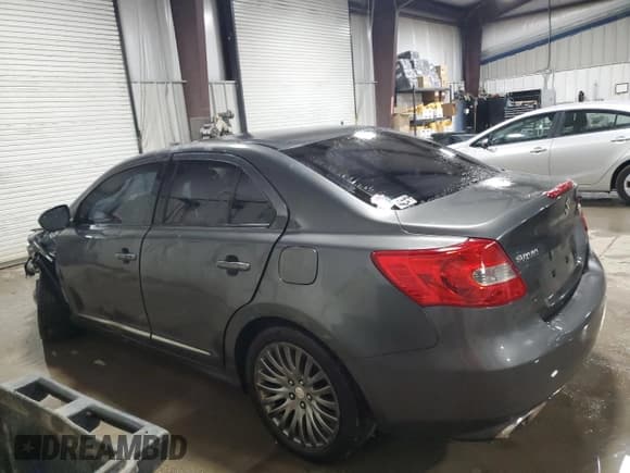 ✅ 2010 Suzuki Kizashi • VIN: JS2RE9A77A6100612 • Лот: 42969175. Опубликован ранее на Copart с пробегом 106 813 миль. Бесплатный доступ к архиву аукционных продаж из США и подробный отчёт об истории автомобиля на DreamBid. Изображение 2.