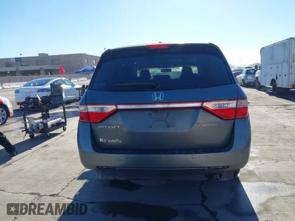✅ 2011 Honda Odyssey Touring • VIN: 5FNRL5H98BB063513 • Lot: 43599881. Listed on IAAI with 125,920 mi. Free auction sales archive from the USA and detailed vehicle history report at DreamBid. Image 16.