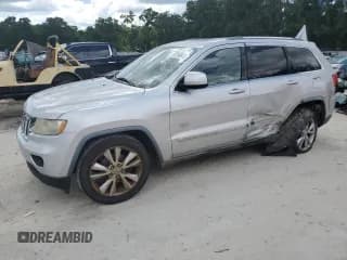 ✅ 2011 Jeep Grand Cherokee Laredo • VIN: 1J4RS4GT1BC676641 • Лот: 61758615. Опубликован ранее на Copart с пробегом 244 453 миль. Бесплатный доступ к архиву аукционных продаж из США и подробный отчёт об истории автомобиля на DreamBid. Изображение 1.