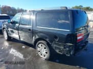 ✅ 2011 Lincoln Navigator • VIN: 5LMJJ3J5XBEJ03910 • Lot: 43693538. Listed on IAAI with 152,404 mi. Free auction sales archive from the USA and detailed vehicle history report at DreamBid. Image 3.