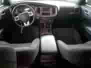 2014 Dodge Charger SE z VIN 2C3CDXBG4EH272014, wystawiony jako Copart lot #85945115 z przebiegiem 130 951 mil mil oraz Szkoda całkowita • Salvage title. Historia ofert i sprzedaży dostępna na DreamBid. Obrazek 8.