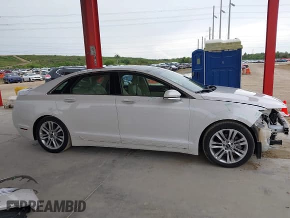 ✅ 2014 Lincoln MKZ Hybrid • VIN: 3LN6L2LU2ER817257 • Lot: 43149857. Listed on IAAI with 117,590 mi. Free auction sales archive from the USA and detailed vehicle history report at DreamBid. Image 14.