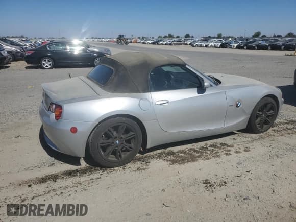 ✅ 2004 BMW Z4 3.0i • VIN: 4USBT53594LU07477 • Lot: 65718545. Listed on Copart with 124,545 mi. Free auction sales archive from the USA and detailed vehicle history report at DreamBid. Image 3.