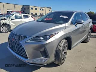 ✅ 2022 Lexus RX 350 • VIN: 2T2HZMDAXNC324133 • Lot: 91471065. Listed on Copart with 74,518 mi. Free auction sales archive from the USA and detailed vehicle history report at DreamBid. Image 1.