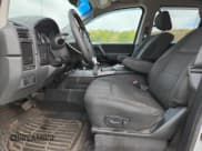 ✅ 2011 Nissan Titan SV • VIN: 1N6BA0EC9BN303452 • Lot: 82271025. Wystawiony na Copart z przebiegiem 193 983 mil. Bezpłatny archiwum sprzedaży aukcyjnych z USA i szczegółowy raport historii pojazdu na DreamBid. Zdjęcie 7.