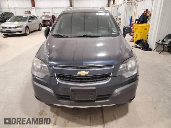 2015 Chevrolet Captiva Sport LS с VIN 3GNAL2EKXFS516070, выставлен на аукционе Copart как лот 82467024 с пробегом 127 948 миль миль и На запчасти • Non repairable. История ставок и продаж доступна на DreamBid. Изображение 5.