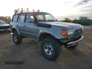 ✅ 1997 Toyota Land Cruiser • VIN: JT3HJ85J3V0170784 • Лот: 83493574. Опубликован ранее на Copart с пробегом 314 737 миль. Бесплатный доступ к архиву аукционных продаж из США и подробный отчёт об истории автомобиля на DreamBid. Изображение 4.