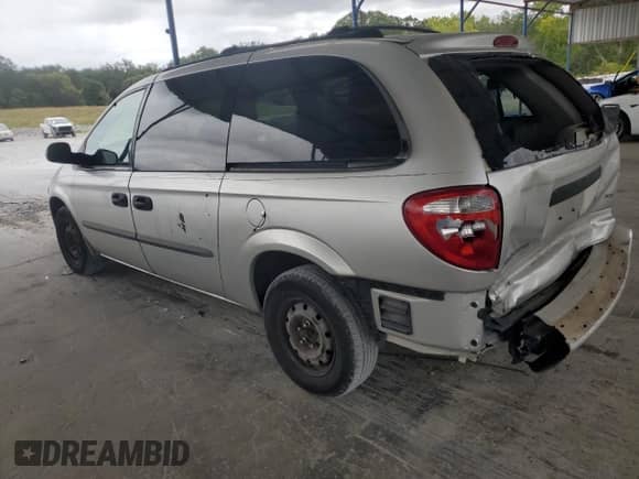 2003 Dodge Caravan SE z VIN 1D4GP24323B127564, wystawiony jako Copart lot #71619744 z przebiegiem 212 542 mil mil oraz Szkoda całkowita • Salvage title. Historia ofert i sprzedaży dostępna na DreamBid. Obrazek 2.