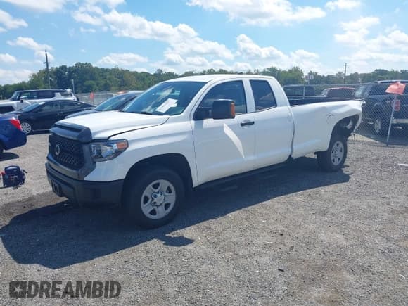 ✅ 2021 Toyota Tundra SR • VIN: 5TFCY5F10MX027263 • Lot: 42963423. Listed on IAAI with 27,429 mi. Free auction sales archive from the USA and detailed vehicle history report at DreamBid. Image 17.