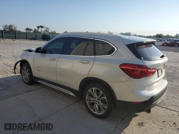 ✅ 2017 BMW X1 xDrive28i • VIN: WBXHT3C37H5F82216 • Lot: 84626495. Listed on Copart with 117,787 mi. Free auction sales archive from the USA and detailed vehicle history report at DreamBid. Image 2.