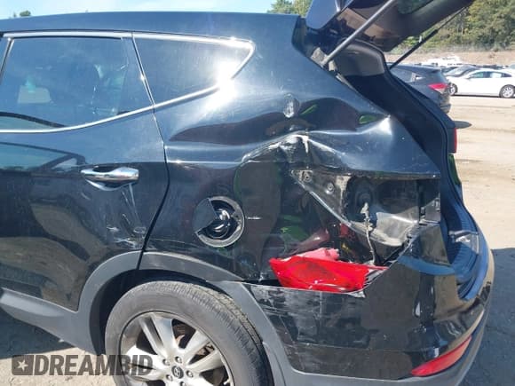 ✅ 2013 Hyundai Santa Fe Sport • VIN: 5XYZWDLA8DG064918 • Лот: 43188919. Опубликован ранее на IAAI с пробегом 97 899 миль. Бесплатный доступ к архиву аукционных продаж из США и подробный отчёт об истории автомобиля на DreamBid. Изображение 6.