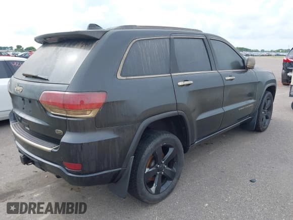✅ 2014 Jeep Grand Cherokee Overland • VIN: 1C4RJFCG2EC247574 • Lot: 42727650. Listed on IAAI with 141,157 mi. Free auction sales archive from the USA and detailed vehicle history report at DreamBid. Image 4.