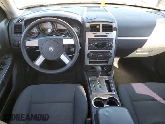 2010 Dodge Charger SXT с VIN 2B3CA3CV5AH252070, выставлен на аукционе Copart как лот 79210224 с пробегом 208 260 миль миль и Списание • Salvage title. История ставок и продаж доступна на DreamBid. Изображение 8.