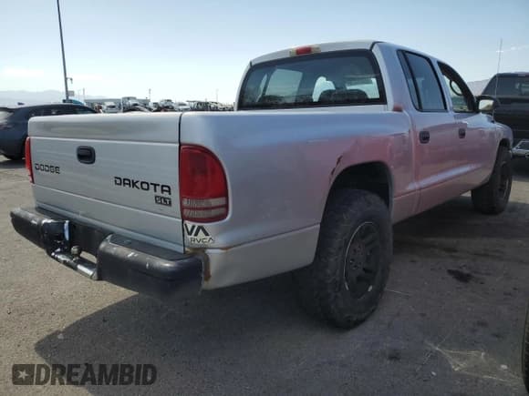 ✅ 2004 Dodge Dakota SLT • VIN: 1D7HL48N04S780843 • Lot: 58639825. Wystawiony na Copart z przebiegiem 166 188 mil. Bezpłatny archiwum sprzedaży aukcyjnych z USA i szczegółowy raport historii pojazdu na DreamBid. Zdjęcie 3.