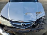 ✅ 2003 Acura TL Type S • VIN: 19UUA56803A052477 • Лот: 92155045. Опубликован ранее на Copart с пробегом 214 637 миль. Бесплатный доступ к архиву аукционных продаж из США и подробный отчёт об истории автомобиля на DreamBid. Изображение 11.