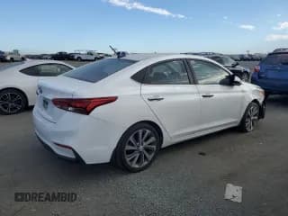 ✅ 2018 Hyundai Accent Limited • VIN: 3KPC34A35JE018975 • Лот: 74818524. Опубликован ранее на Copart с пробегом 57 063 миль. Бесплатный доступ к архиву аукционных продаж из США и подробный отчёт об истории автомобиля на DreamBid. Изображение 3.