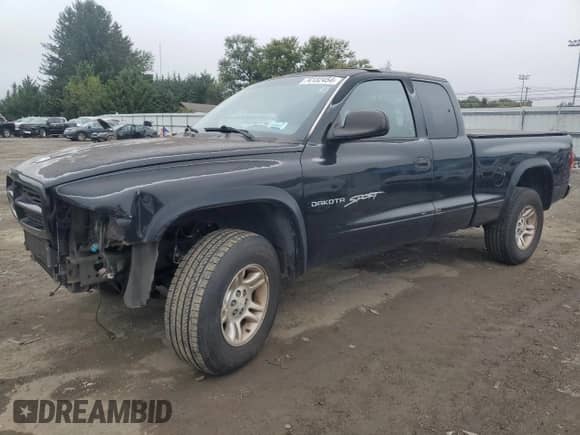 2001 Dodge Dakota Sport z VIN 1B7GG22N01S129747, wystawiony jako Copart lot #74132454 z przebiegiem 180 890 mil mil oraz Szkoda całkowita • Salvage title. Historia ofert i sprzedaży dostępna na DreamBid. Obrazek 1.