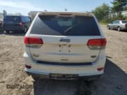 ✅ 2014 Jeep Grand Cherokee Summit • VIN: 1C4RJFJG2EC214092 • Lot: 70781765. Listed on Copart with 235,693 mi. Free auction sales archive from the USA and detailed vehicle history report at DreamBid. Image 6.