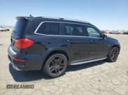 ✅ 2015 Mercedes-Benz GL 63 AMG • VIN: 4JGDF7EE8FA456517 • Lot: 61684425. Listed on Copart with 84,136 mi. Free auction sales archive from the USA and detailed vehicle history report at DreamBid. Image 3.
