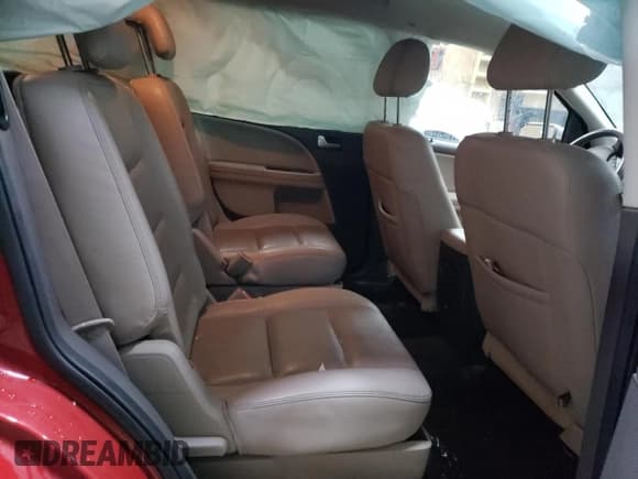 ✅ 2009 Ford Taurus X Limited • VIN: 1FMDK03W89GA03241 • Лот: 49675885. Опубликован ранее на Copart с пробегом 101 514 миль. Бесплатный доступ к архиву аукционных продаж из США и подробный отчёт об истории автомобиля на DreamBid. Изображение 11.