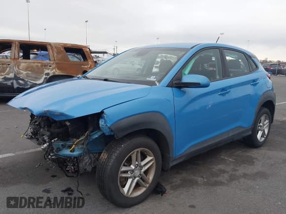 ✅ 2019 Hyundai Kona SE • VIN: KM8K1CAAXKU371995 • Лот: 43710070. Опубликован ранее на IAAI с пробегом 65 736 миль. Бесплатный доступ к архиву аукционных продаж из США и подробный отчёт об истории автомобиля на DreamBid. Изображение 2.
