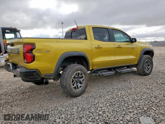 ✅ 2023 Chevrolet Colorado 4WD ZR2 • VIN: 1GCPTFEK5P1226820 • Лот: 84005615. Опубликован ранее на Copart с пробегом 37 685 миль. Бесплатный доступ к архиву аукционных продаж из США и подробный отчёт об истории автомобиля на DreamBid. Изображение 3.