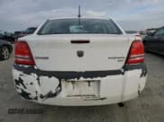 ✅ 2010 Dodge Avenger SXT • VIN: 1B3CC4FB8AN152182 • Лот: 77590724. Опубликован ранее на Copart с пробегом 184 822 миль. Бесплатный доступ к архиву аукционных продаж из США и подробный отчёт об истории автомобиля на DreamBid. Изображение 6.