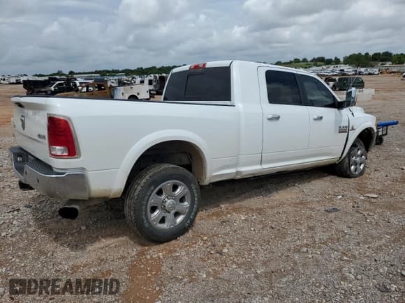 ✅ 2015 Ram 2500 Laramie • VIN: 3C6UR5NL4FG569422 • Lot: 62017655. Listed on Copart with 100,400 mi. Free auction sales archive from the USA and detailed vehicle history report at DreamBid. Image 3.