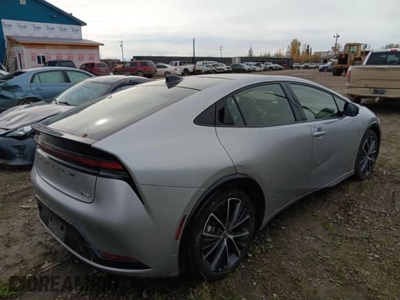 2023 Toyota Prius LE with VIN JTDADABU9P3002451, listed as a Copart auction lot 80668485 with 16,977 mi miles and Salvage title. Bid and sale history available at DreamBid. Image 3.