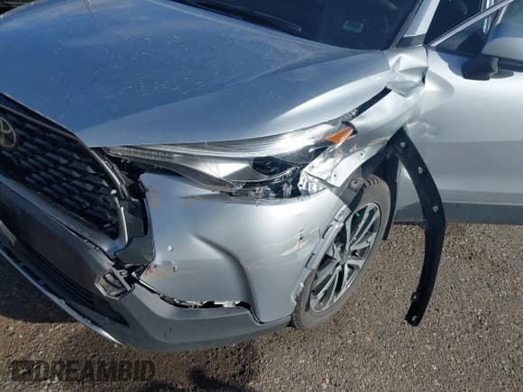 ✅ 2023 Toyota Corolla Cross XLE • VIN: 7MUDAABG7PV077220 • Lot: 43137122. Listed on IAAI with 37,620 mi. Free auction sales archive from the USA and detailed vehicle history report at DreamBid. Image 6.