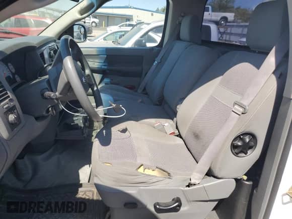 2007 Dodge 1500 SLT with VIN 1D7HA16217J521107, listed as a Copart auction lot 63311714 with 162,428 mi miles and Salvage title. Bid and sale history available at DreamBid. Image 7.