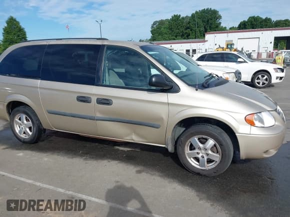 ✅ 2006 Dodge Grand Caravan SE • VIN: 1D4GP24R36B734422 • Lot: 42302517. Wystawiony na IAAI z przebiegiem 217 946 mil. Bezpłatny archiwum sprzedaży aukcyjnych z USA i szczegółowy raport historii pojazdu na DreamBid. Zdjęcie 6.