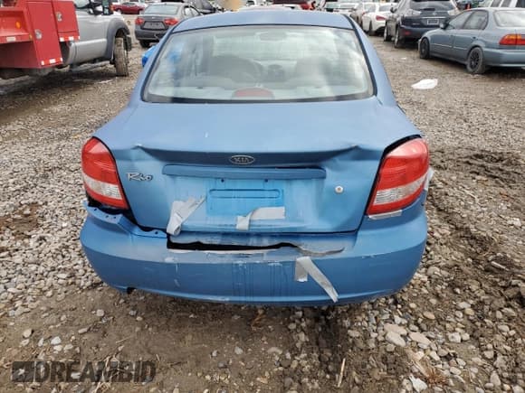 ✅ 2005 Kia Rio • VIN: KNADC125156375937 • Лот: 45710075. Опубликован ранее на Copart с пробегом 114 050 миль. Бесплатный доступ к архиву аукционных продаж из США и подробный отчёт об истории автомобиля на DreamBid. Изображение 6.