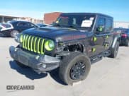 ✅ 2023 Jeep Gladiator Mojave • VIN: 1C6JJTEGXPL517914 • Lot: 43666074. Listed on IAAI with 33,445 mi. Free auction sales archive from the USA and detailed vehicle history report at DreamBid. Image 2.