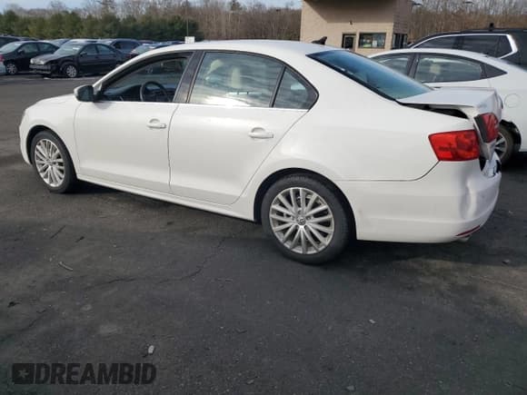 ✅ 2014 Volkswagen Jetta SEL • VIN: 3VWL17AJ2EM218808 • Lot: 46510195. Listed on Copart with 36,657 mi. Free auction sales archive from the USA and detailed vehicle history report at DreamBid. Image 2.