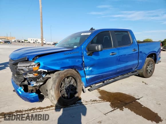 ✅ 2023 Chevrolet Silverado 1500 Custom • VIN: 1GCPABEK0PZ157387 • Лот: 86318865. Опубликован ранее на Copart с пробегом 130 023 миль. Бесплатный доступ к архиву аукционных продаж из США и подробный отчёт об истории автомобиля на DreamBid. Изображение 1.