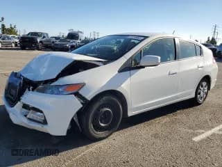✅ 2014 Honda Insight • VIN: JHMZE2H33ES002774 • Lot: 87229955. Wystawiony na Copart z przebiegiem 136 916 mil. Bezpłatny archiwum sprzedaży aukcyjnych z USA i szczegółowy raport historii pojazdu na DreamBid. Zdjęcie 1.