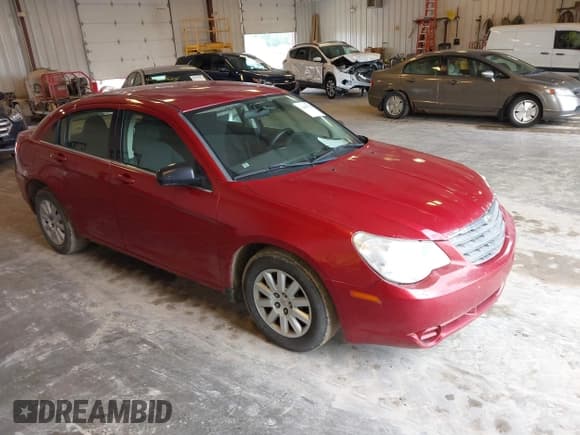 ✅ 2009 Chrysler Sebring LX • VIN: 1C3LC46B29N527868 • Lot: 42645924. Listed on IAAI with 265,766 mi. Free auction sales archive from the USA and detailed vehicle history report at DreamBid. Image 1.