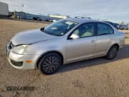 ✅ 2009 Volkswagen Jetta S • VIN: 3VWJZ71K79M036293 • Lot: 94152295. Listed on Copart with 151,542 mi. Free auction sales archive from the USA and detailed vehicle history report at DreamBid. Image 1.